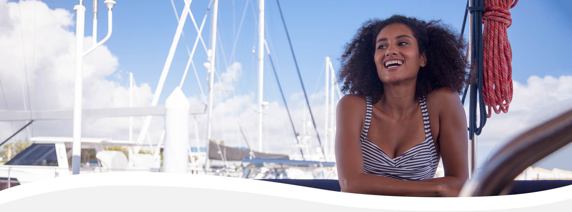 Woman on a boat smiling